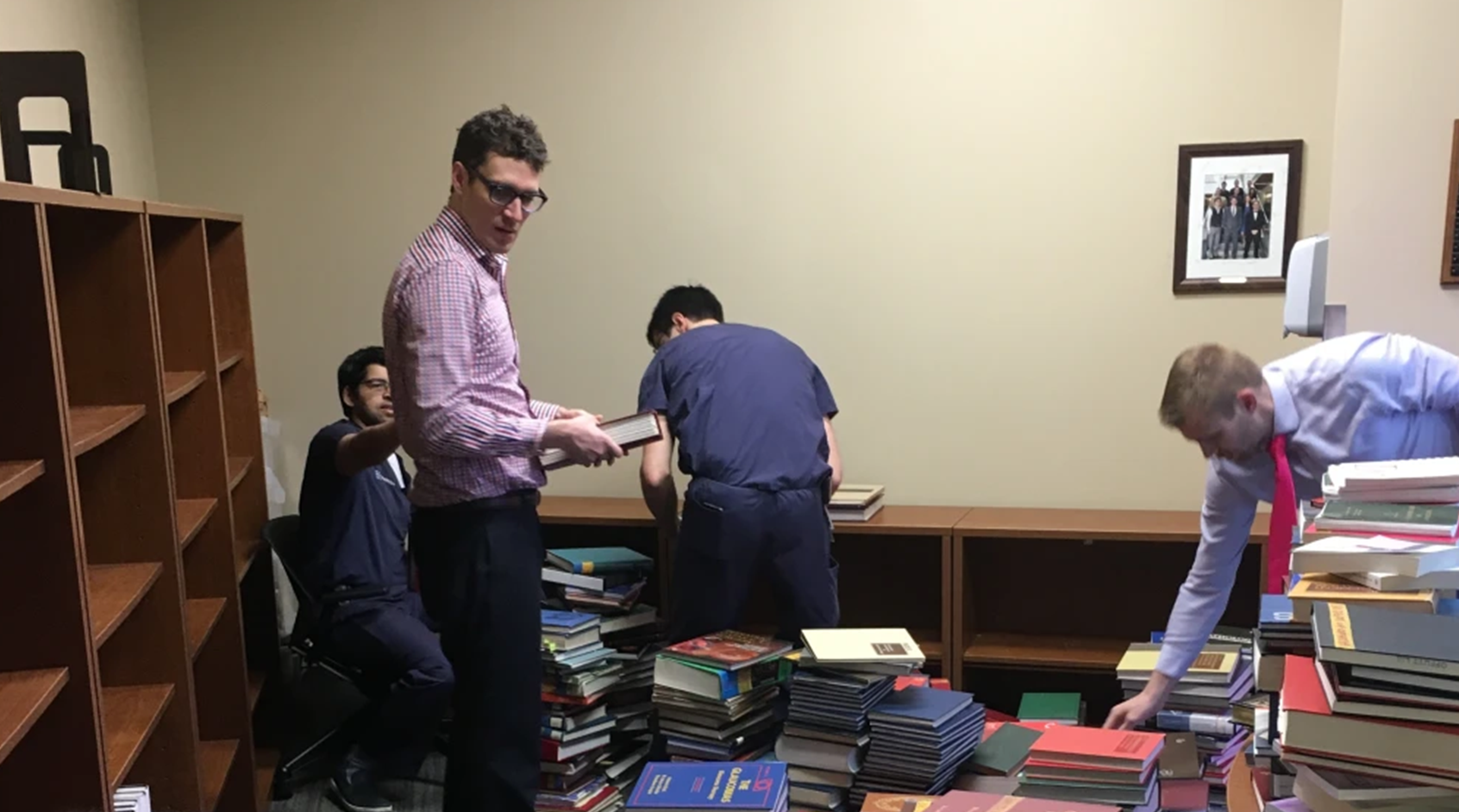 Residents stacking books