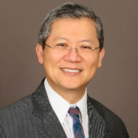 a headshot style photo of Dr. Kevin Wang 