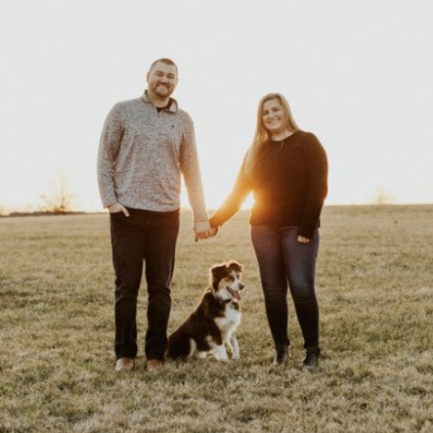 Brenna Kaelin with her spouse and their dog
