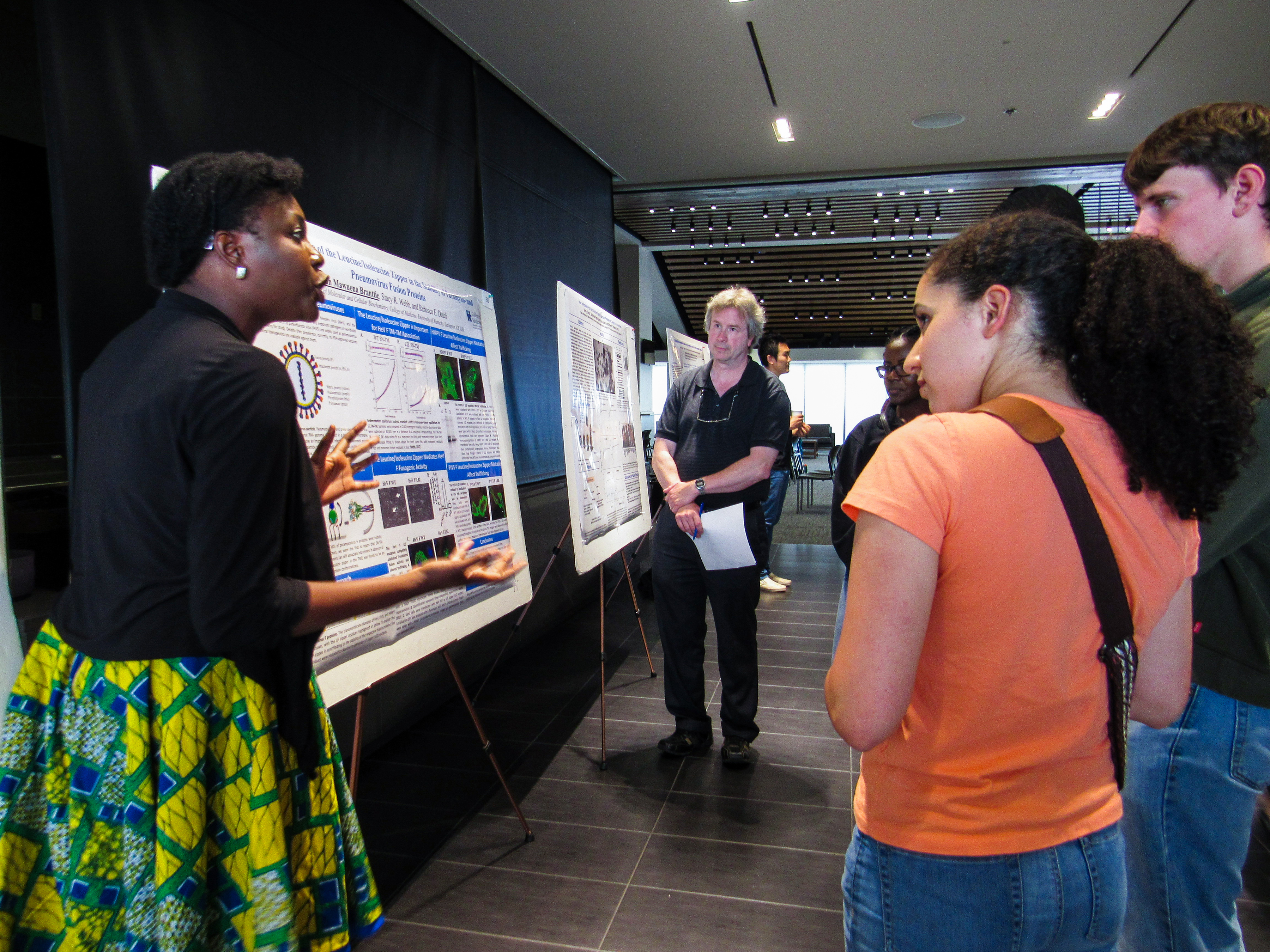 Students presenting posters.