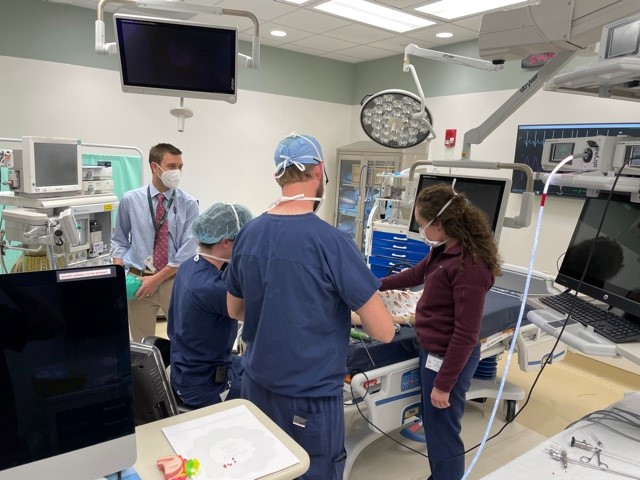 While Dr. Noblitt and Dr. July O’Brien observe, Dr. Trott performs rigid bronchoscopy with simulated foreign body removal. Dr. Iverson actively changes patient parameters to simulate real-world scenarios in encountered in the OR.