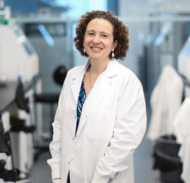 Dr. Messaoudi in forefront and lab in background