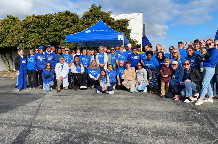Barnstable Brown Diabetes Center team members outside under a blue tent.