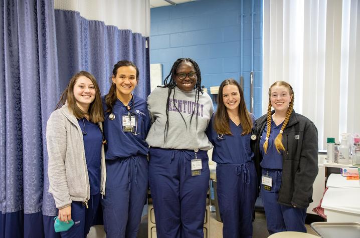 (From left:) Jenna Tinnell, Kylie Cochran, DeAsia King, Lauren Hudson and Madilyn Limeberry, students in the UK College of Medicine, volunteer to care for the young residents of the Salvation Army.