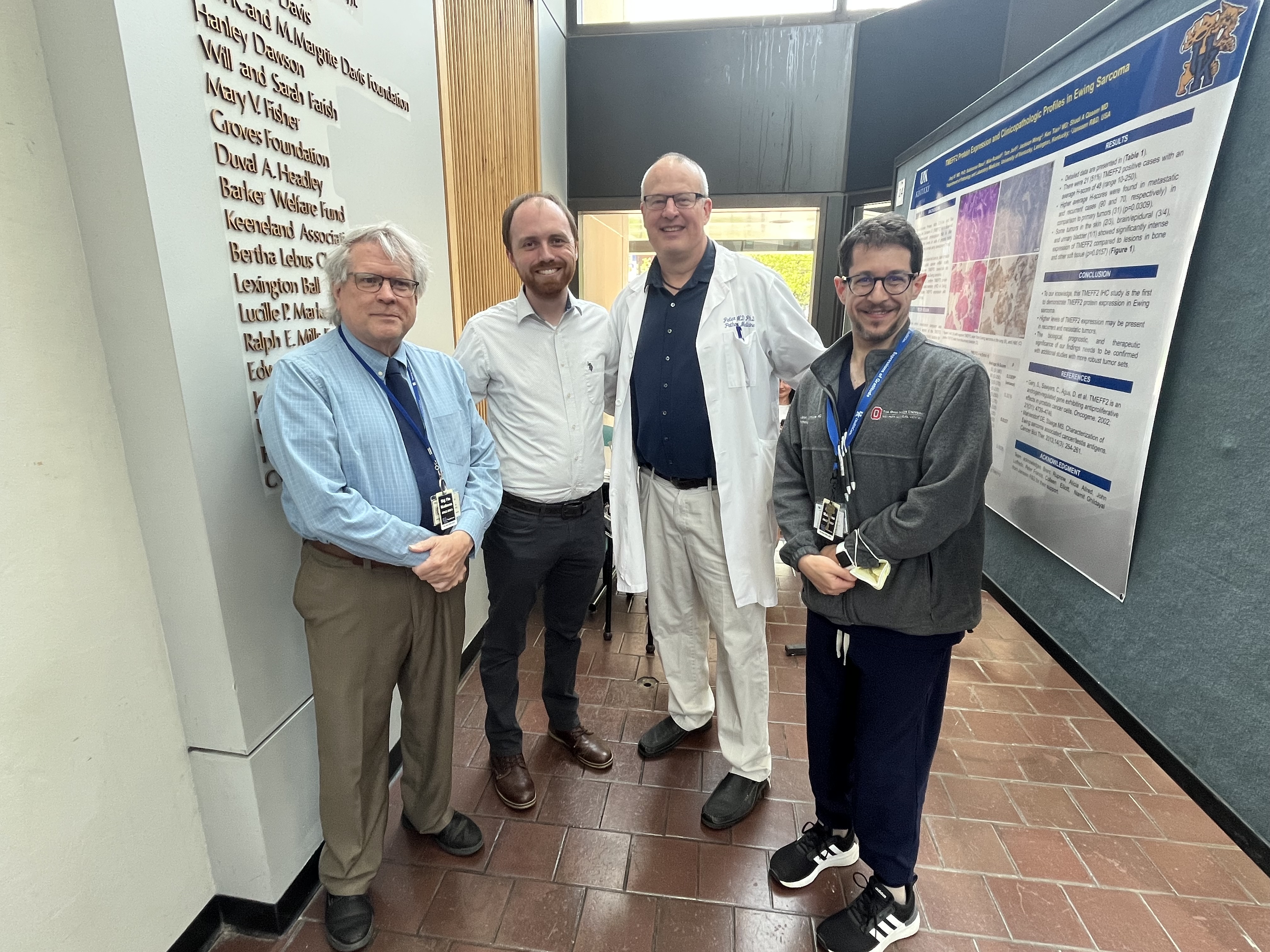 Chester Jennings, MD, Justin Miller, PhD, Pete Nelson, MD, and Aaron Shmookler, MD at Research Day.