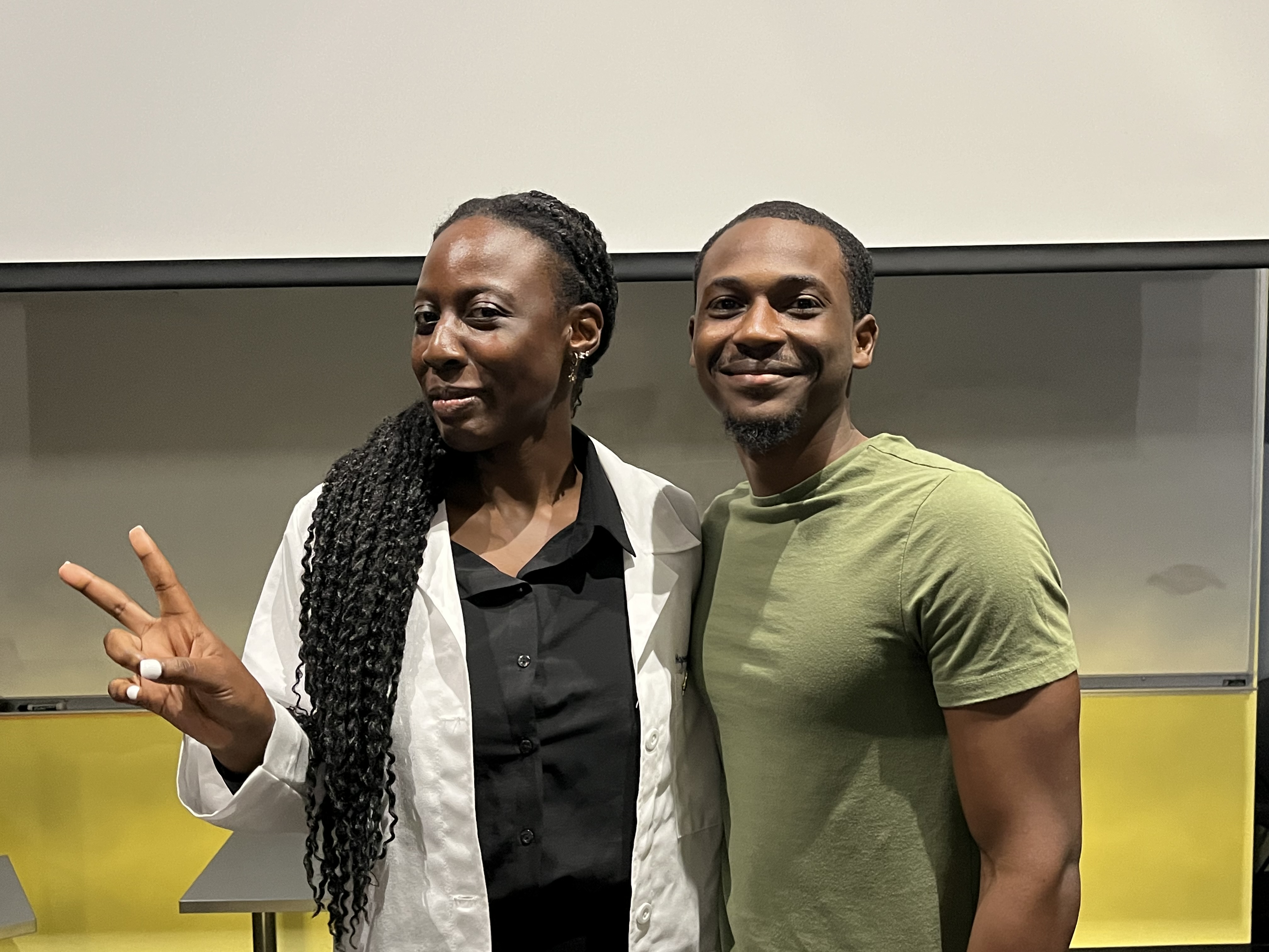 a photo of peer mentor Edric Winford and AARTS student Hopemarie Makumbi 