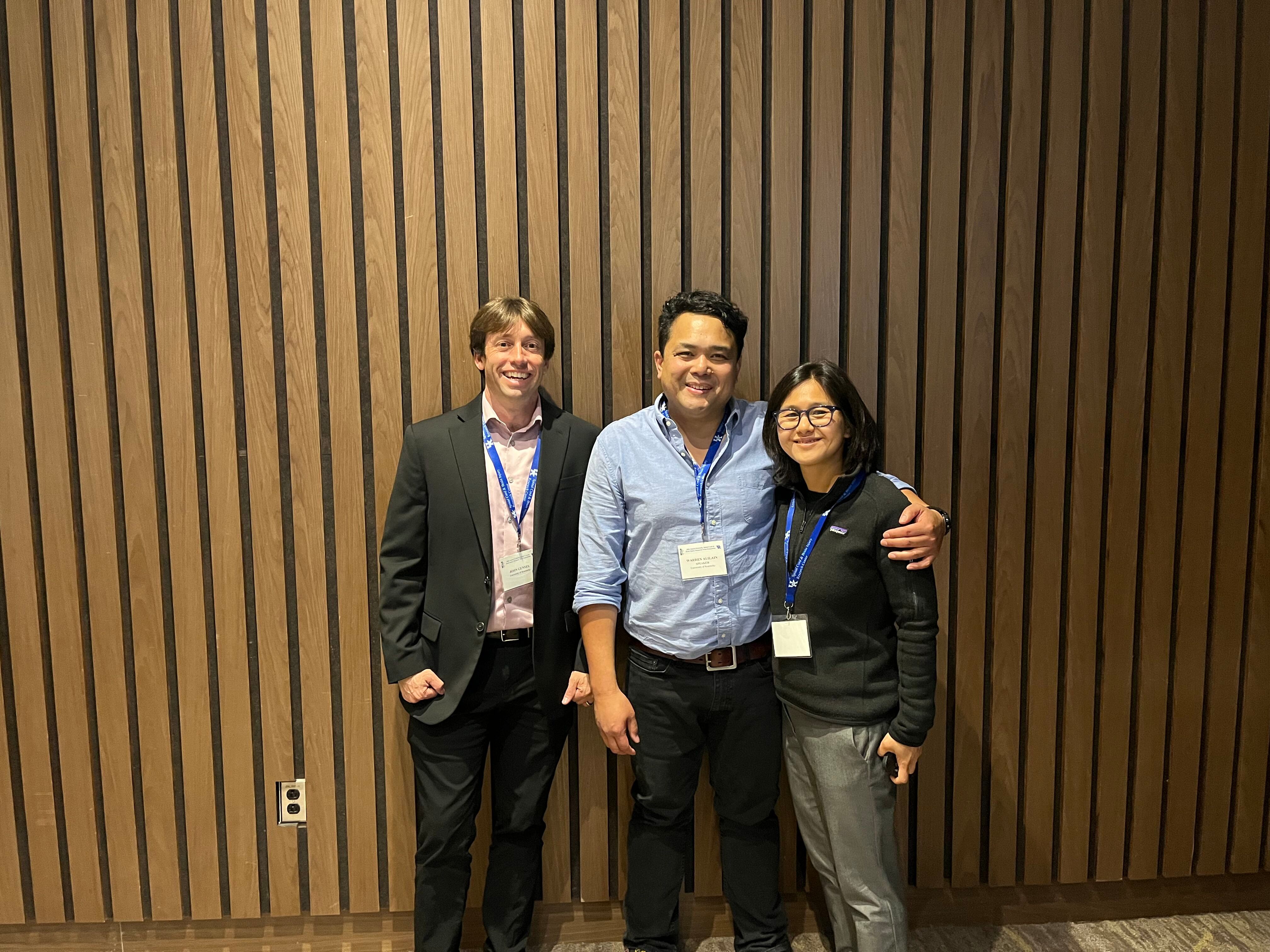 a photo of Dr. John Gensel, Dr. Warren Alilain, and Dr, Mayumi Prins at the 2023 KSCHIRT conference 