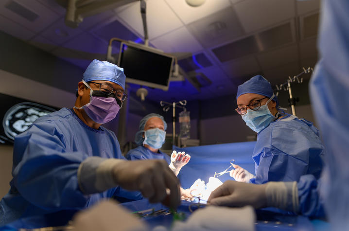 Markey Cancer Center personnel conducting a surgical procedure.