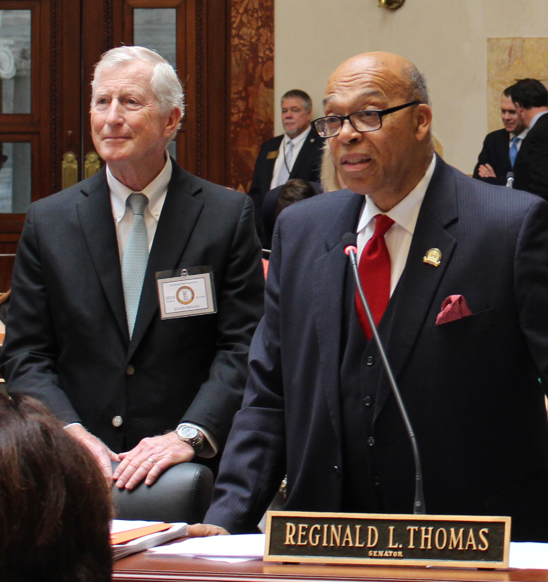 Kentucky Sen. Reginald Thomas and Dr. Pat McGrath during reading of a resolution honoring his career in surgical oncology  
