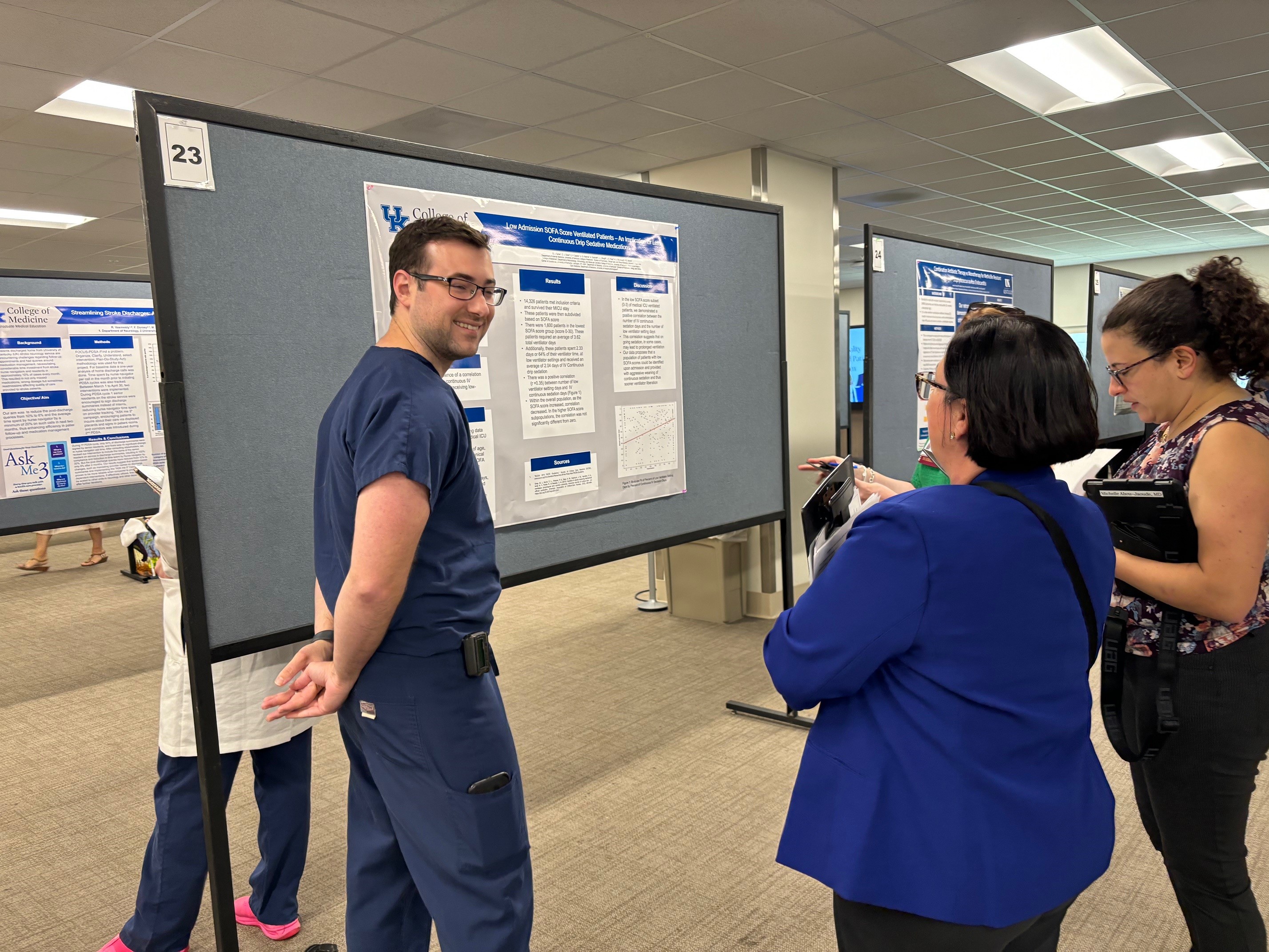 resident presents poster at forum 