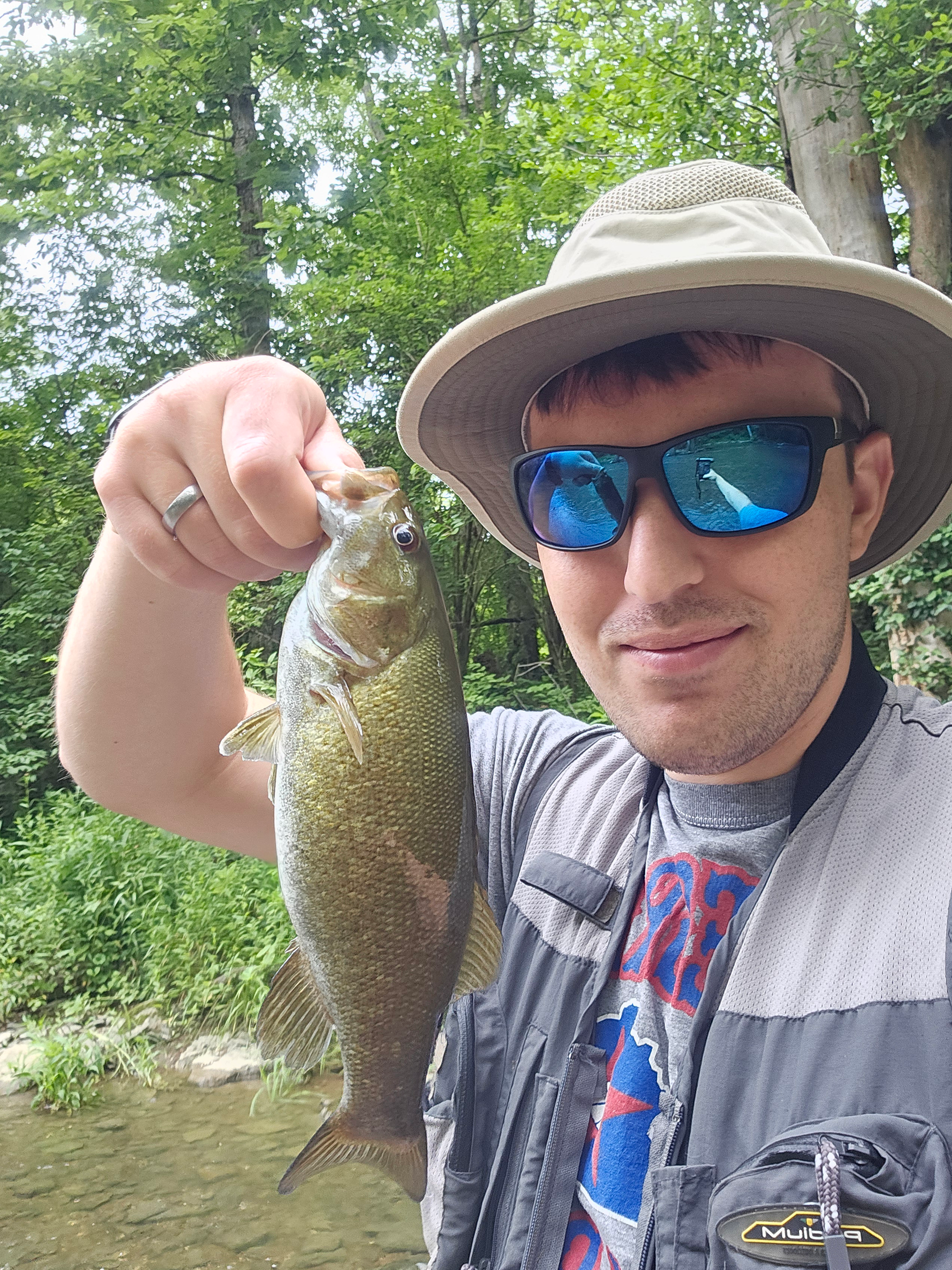 Jerod Crockett posing with a fish he caught.