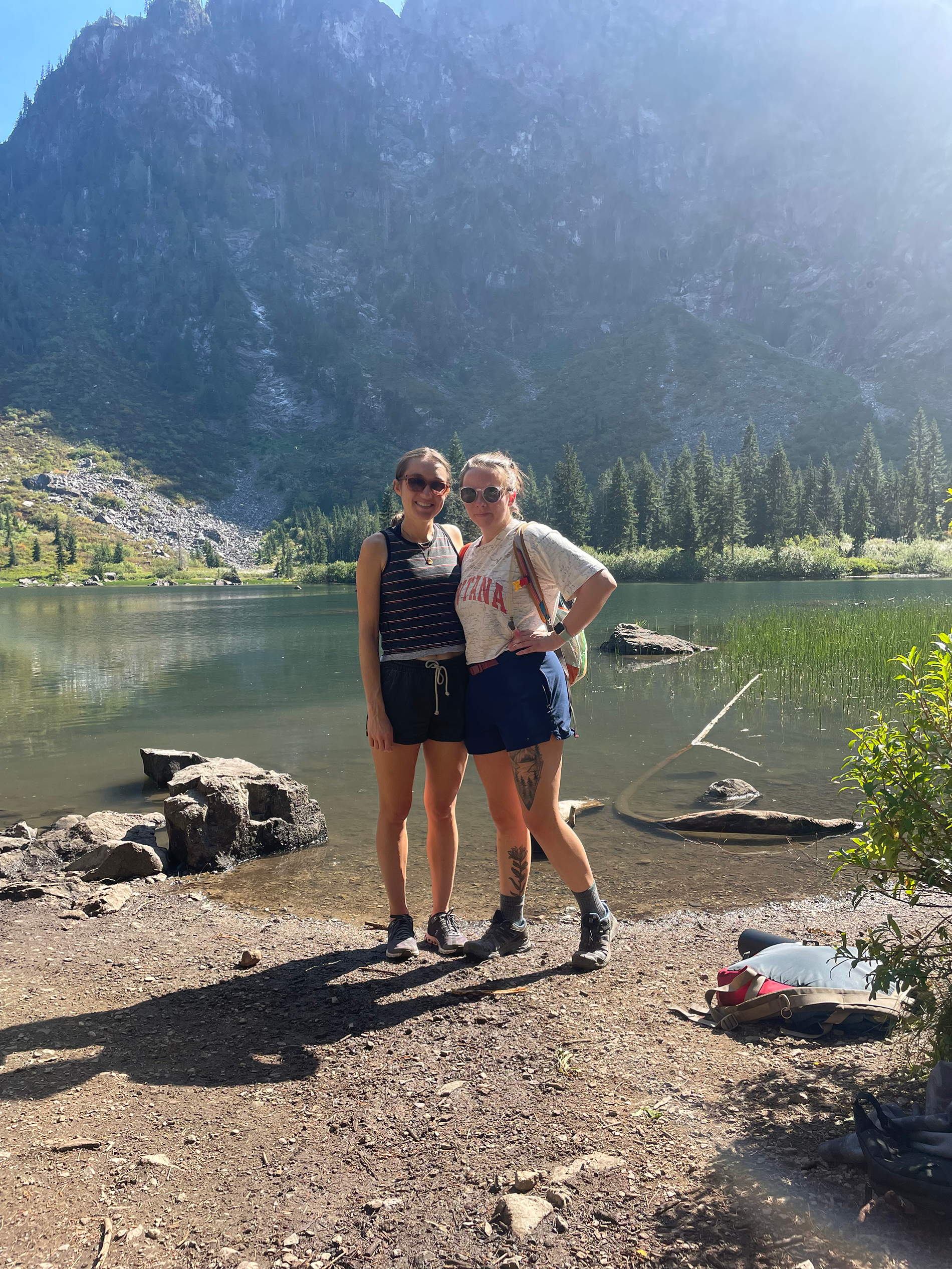 Sonja France and friend posing by a lake.