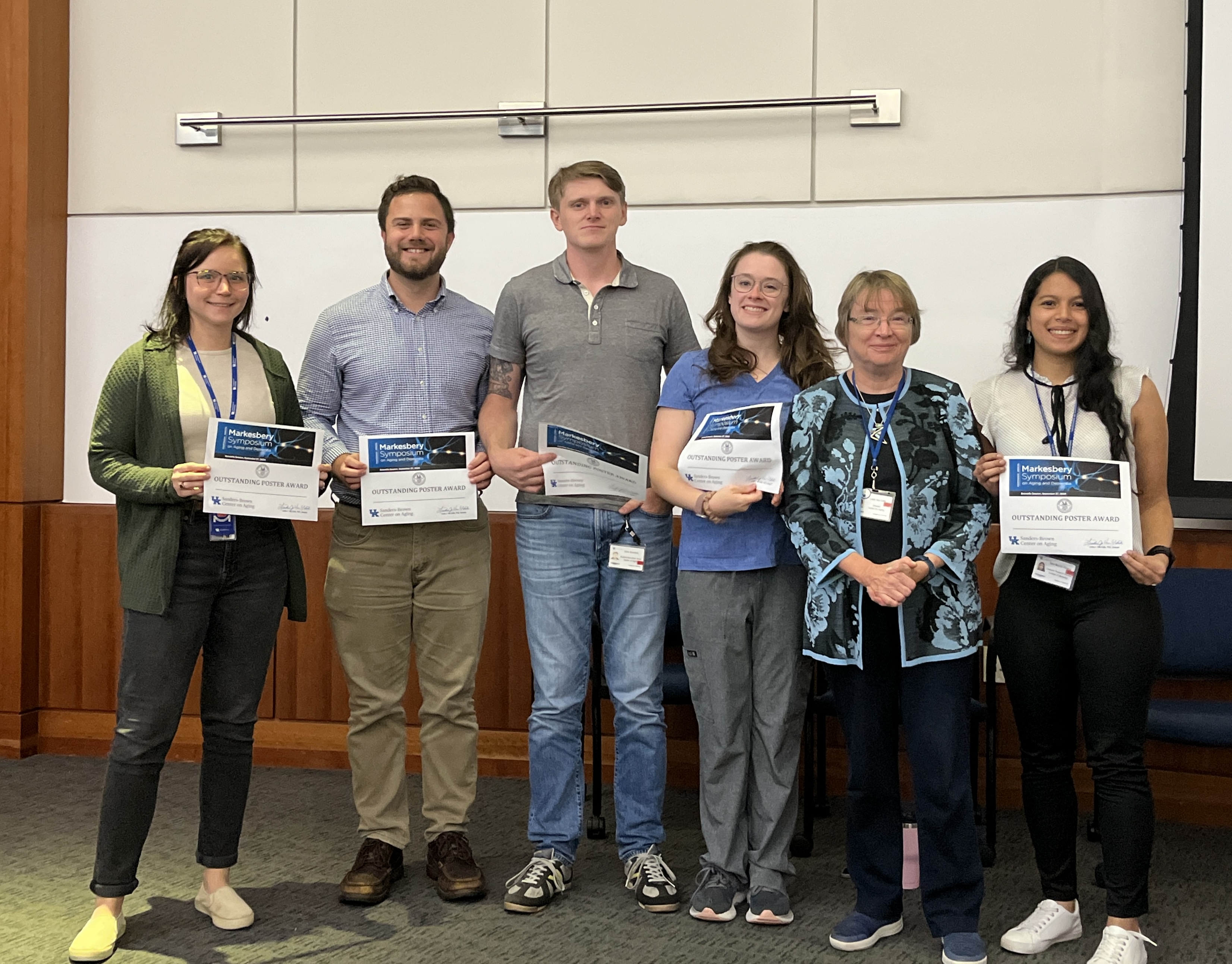 Grad Student Winners Riley Irmen Blaine Weiss Christopher Saunders Patty Doyle Linda VanEldik Sara Palacio.jpg