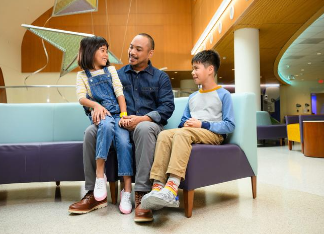 family sitting in new bhu center