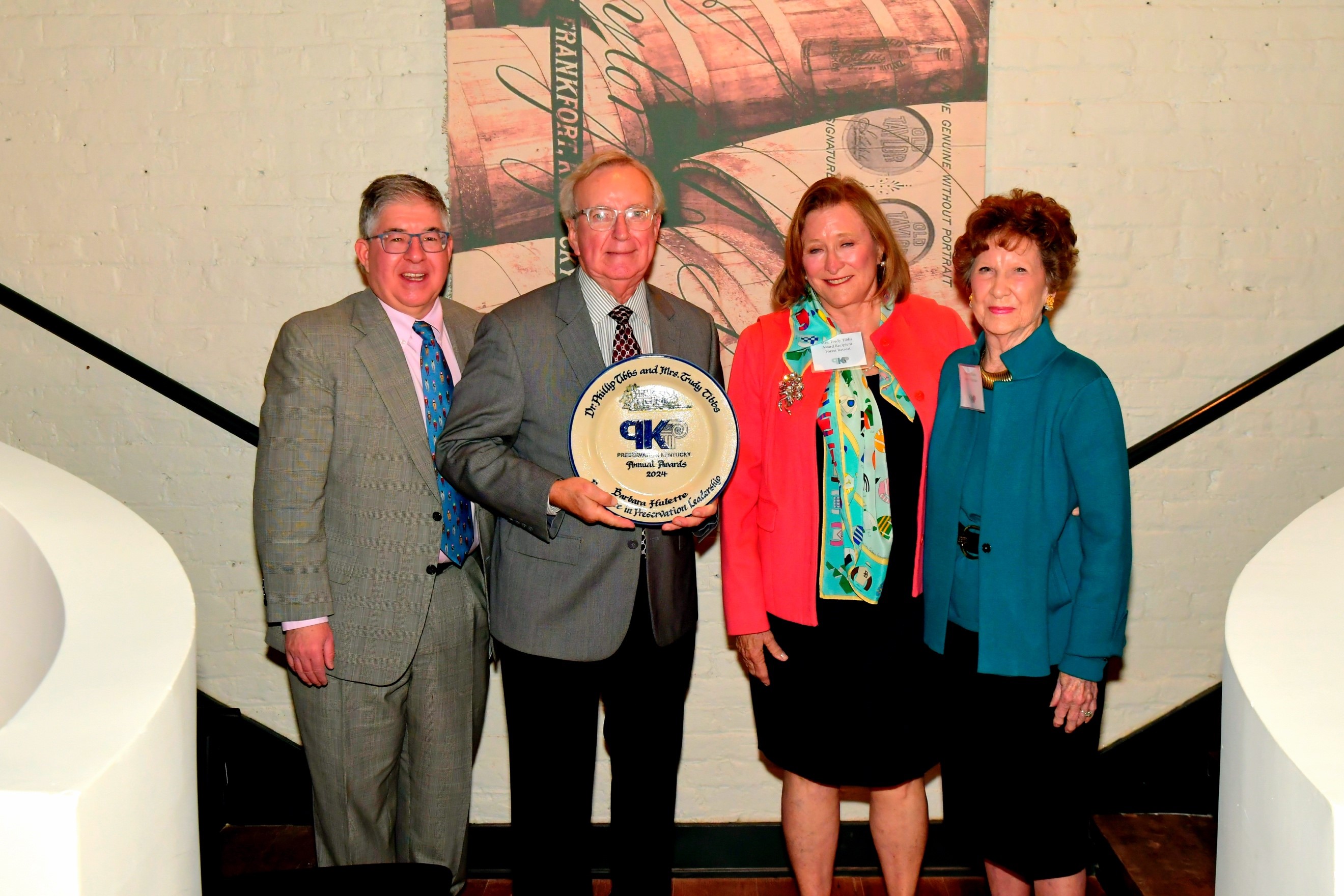 Left to right: Grady Walter, Preservation Kentucky Board Chair; Dr. Phillip and Mrs. Trudy Tibbs, award recipients; and Barbara Hulette, award namesake.