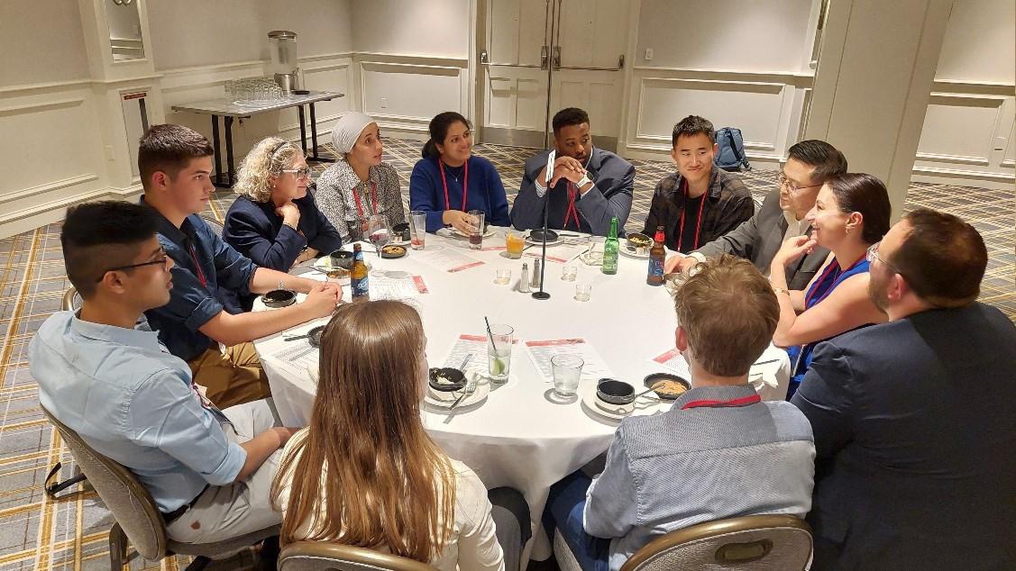 Jimmy Xue attends dinner with colleagues at the 48th Annual Shock Society Conference. 