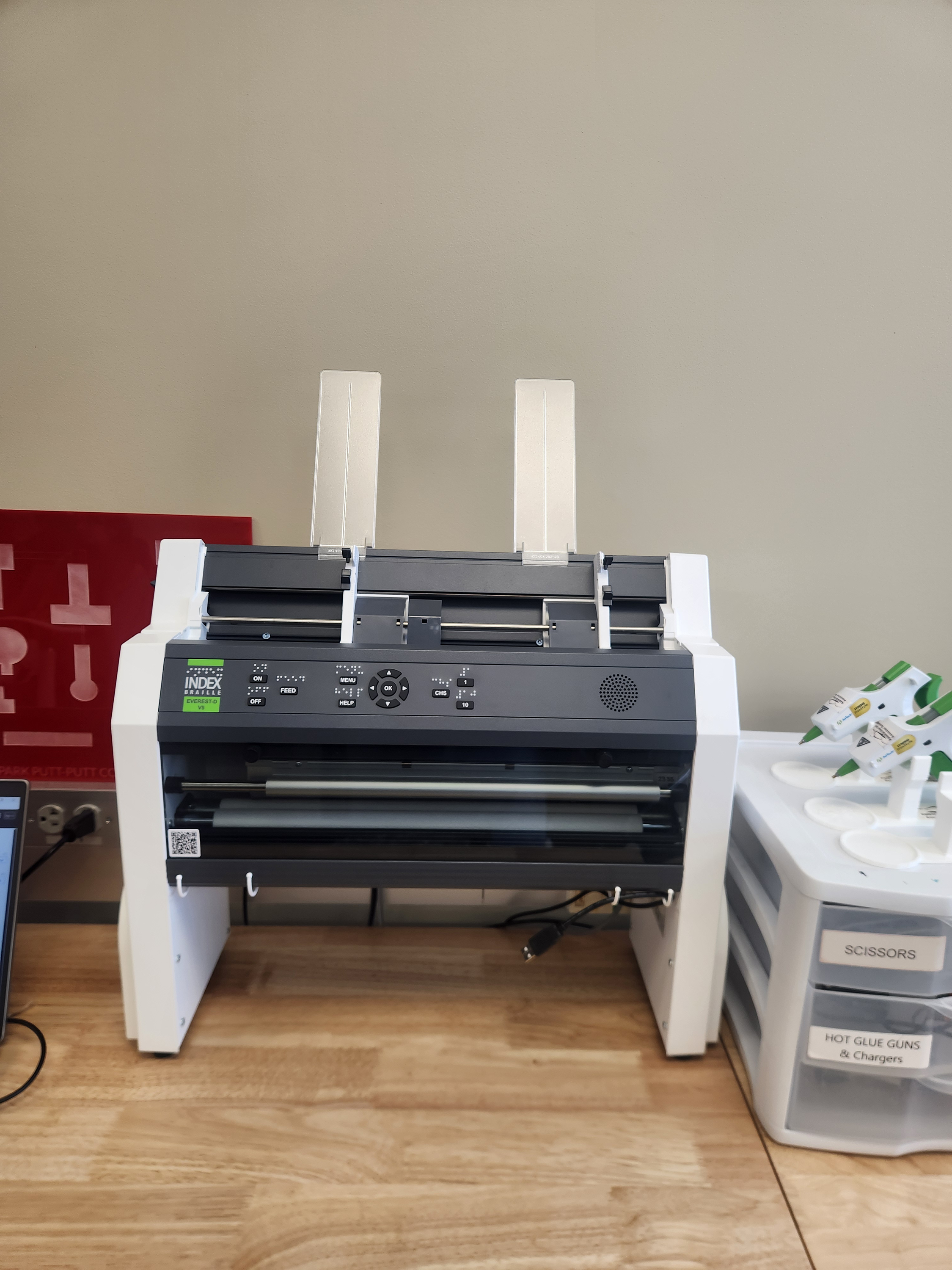 A 3-D printer and a braille embosser at ACAT, one of a few available in Kentucky