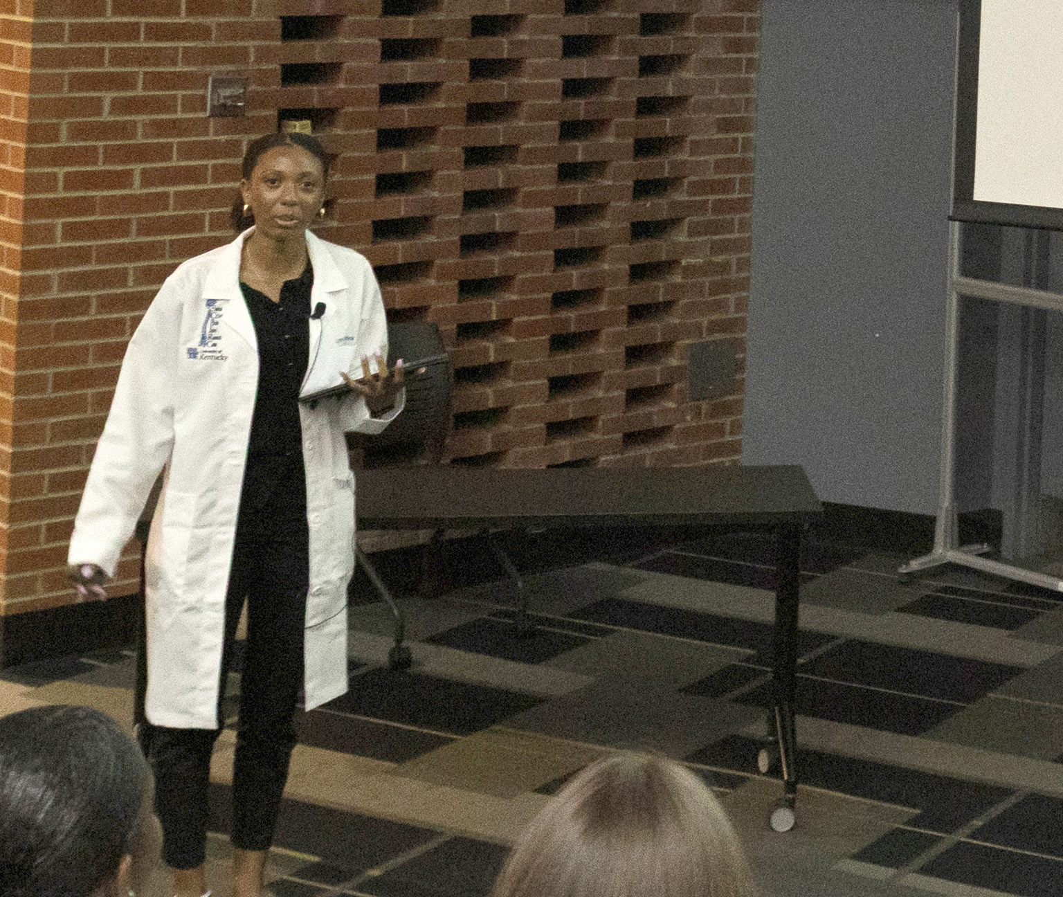 Lyric Johnson presents research during the 2025 AARTS Symposium