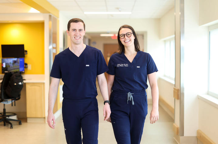 Vince Gouge, MD, pediatric chief resident at UK HealthCare, left, and his wife Kaylee Gouge, MD, internal medicine and pediatric fourth year resident