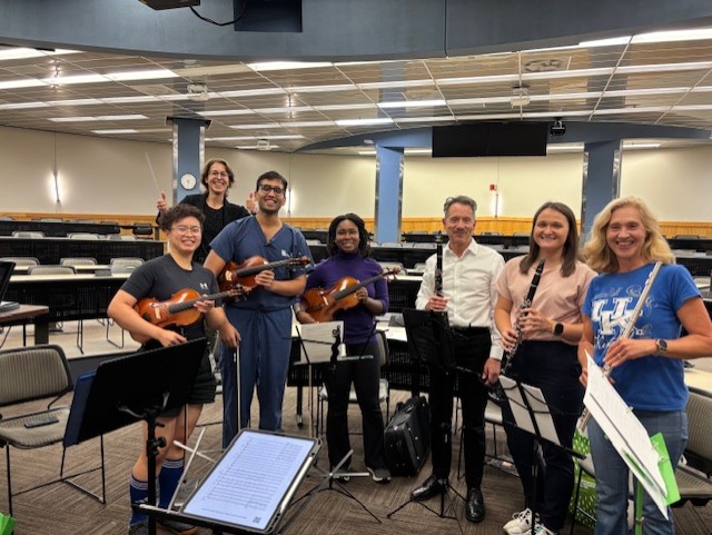 Group of musicians smiling