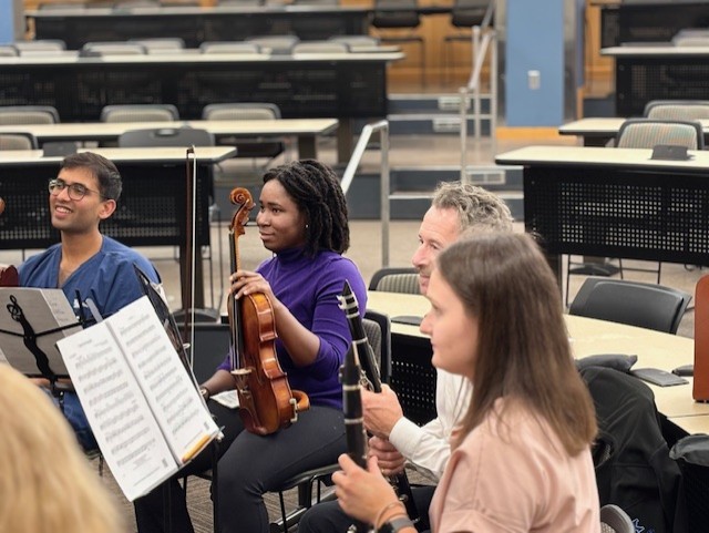 Group practicing instruments together