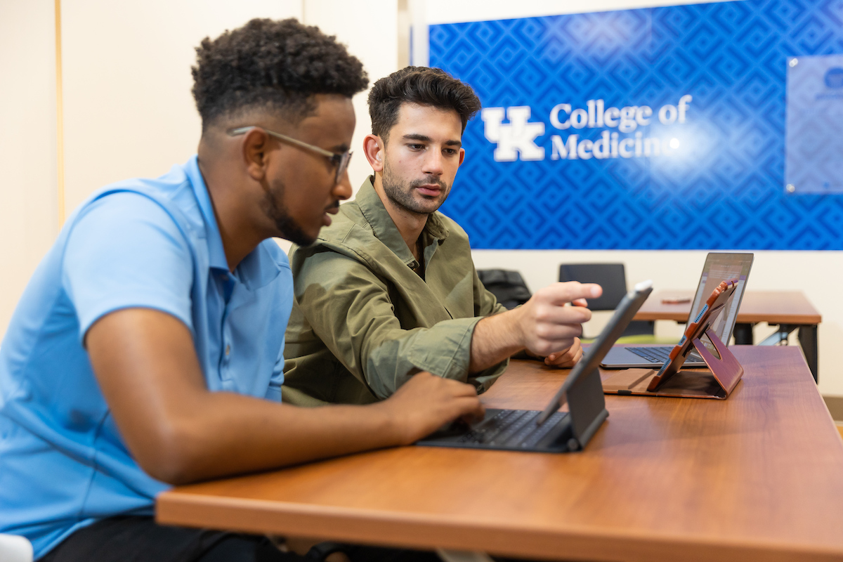med students in a classroom studying together