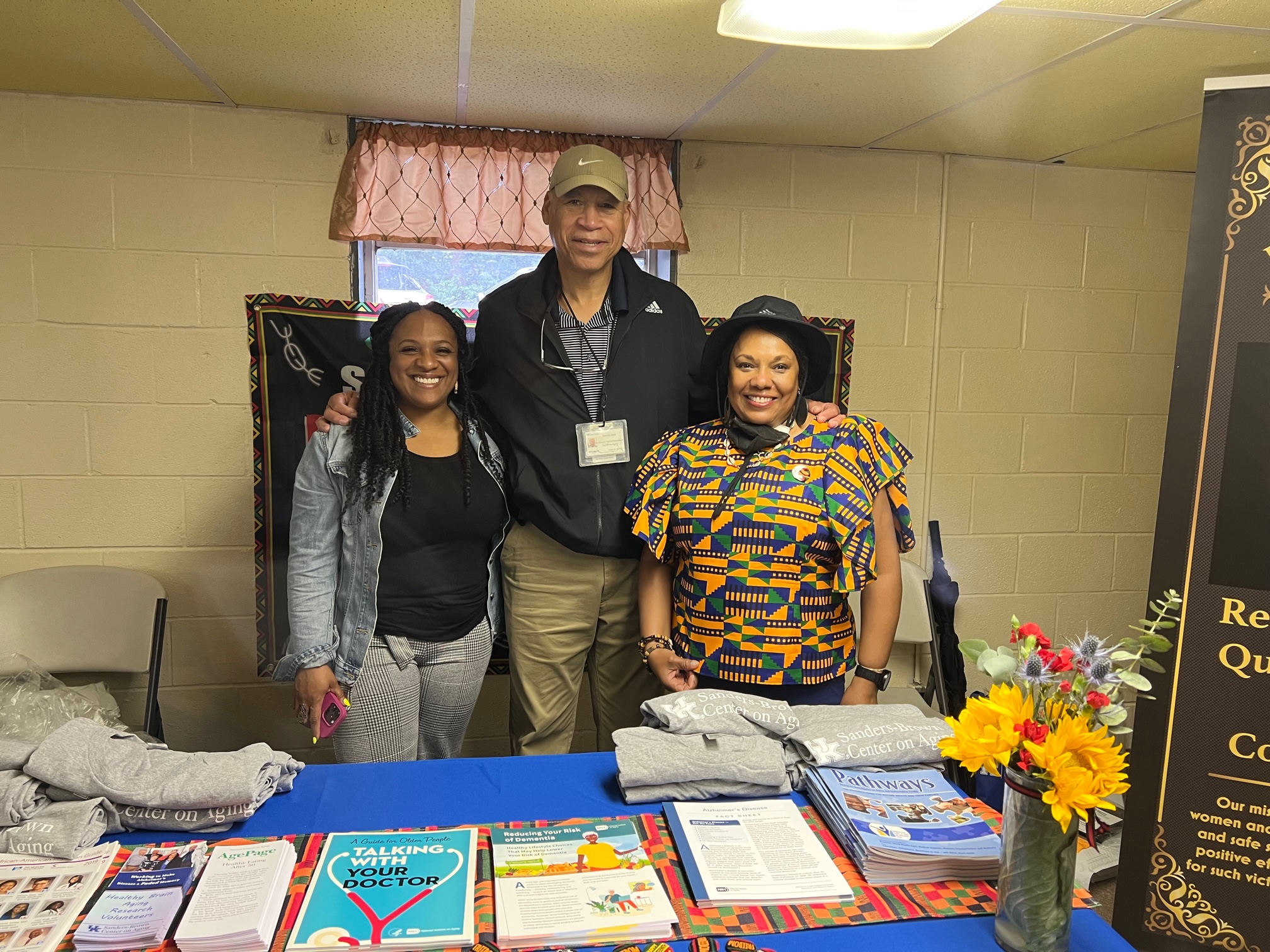 Staff with Sanders-Brown information table