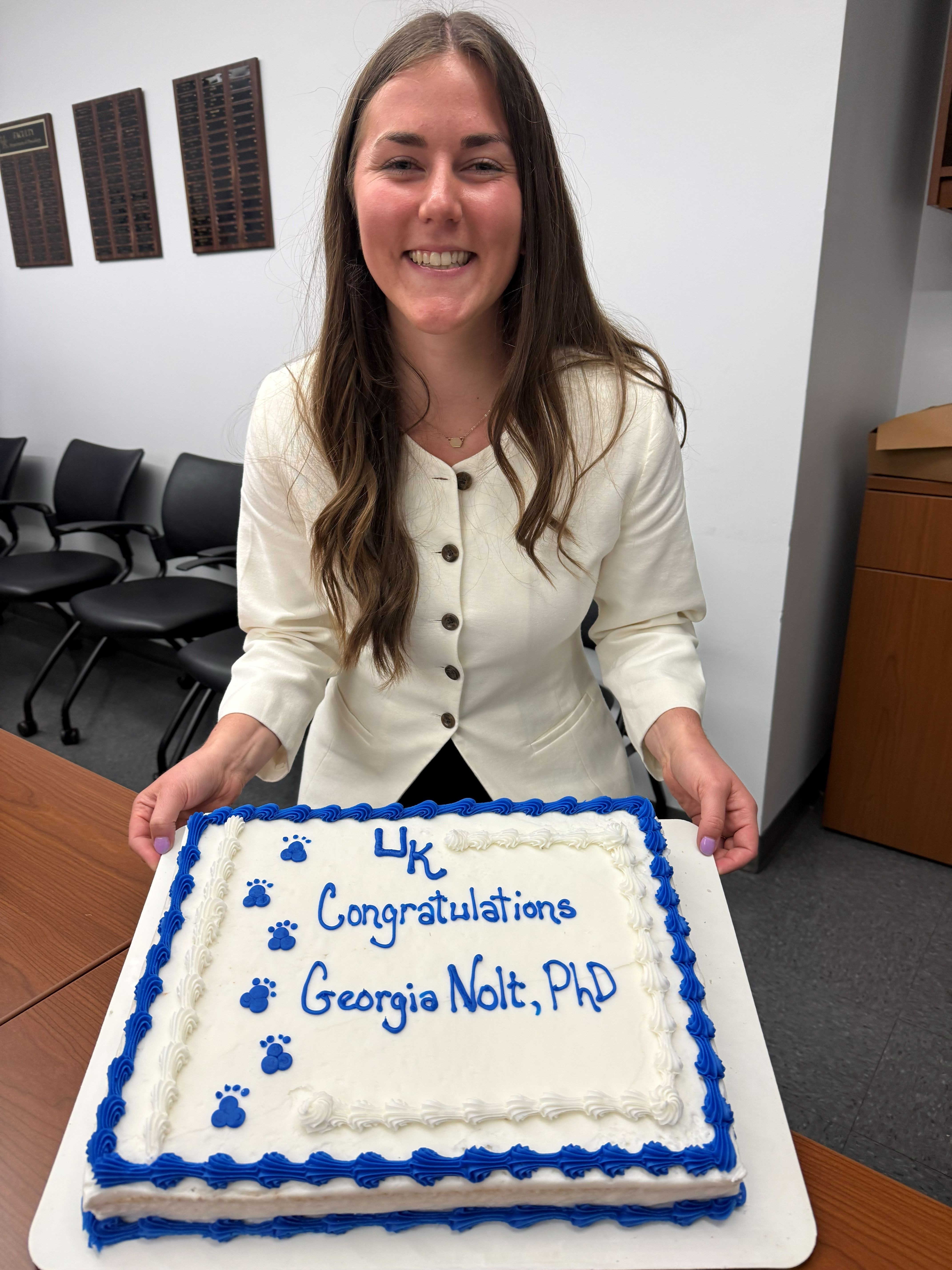 Dr. Nolt displays her congratulatory cake. 