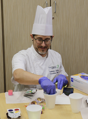 Chef Nicholas Duke helped pediatric patients paint on their desserts.