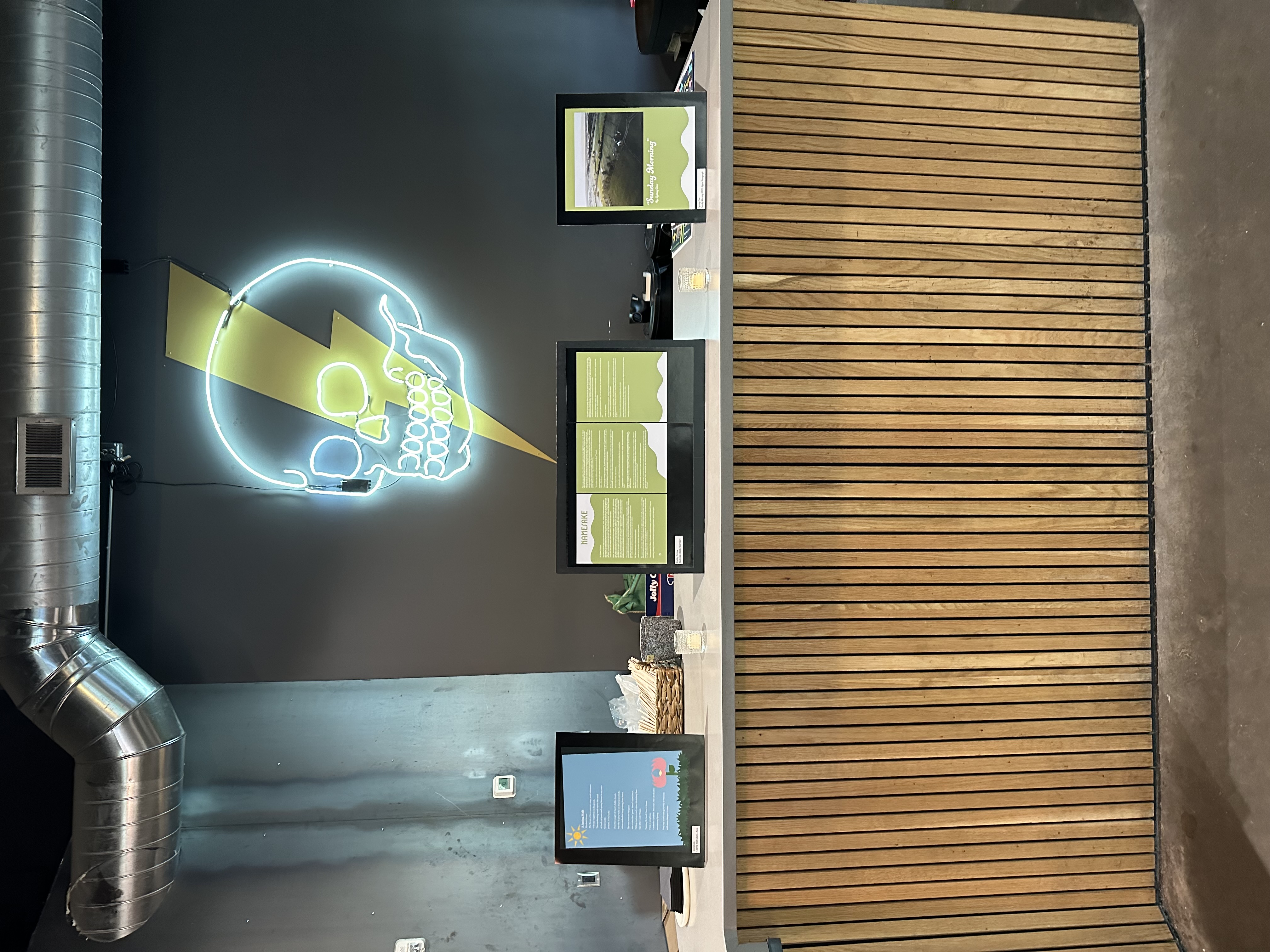Placards on a bar area of artwork from medical humanities group