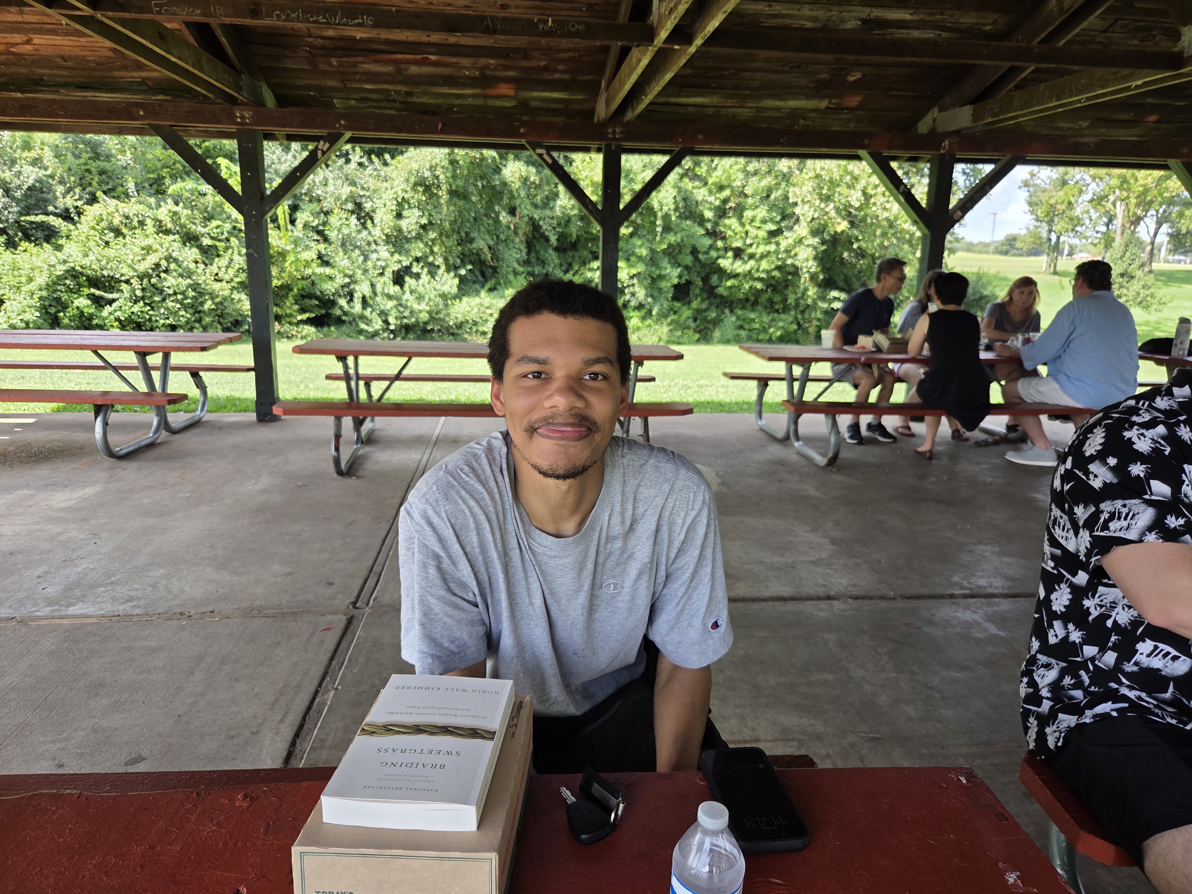 Resident relaxing at shelter table