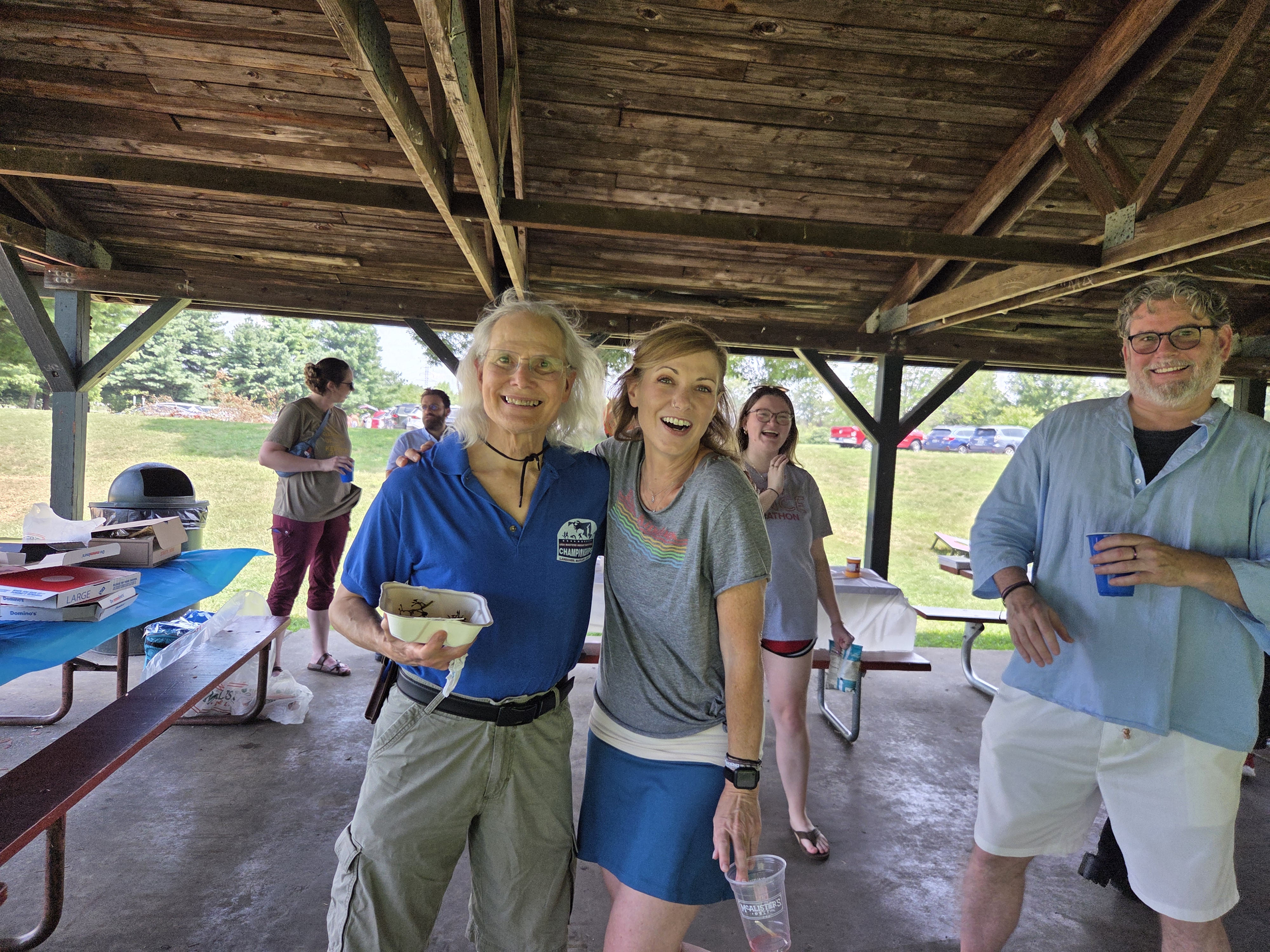 Faculty and Attendees enjoy a meal at the park