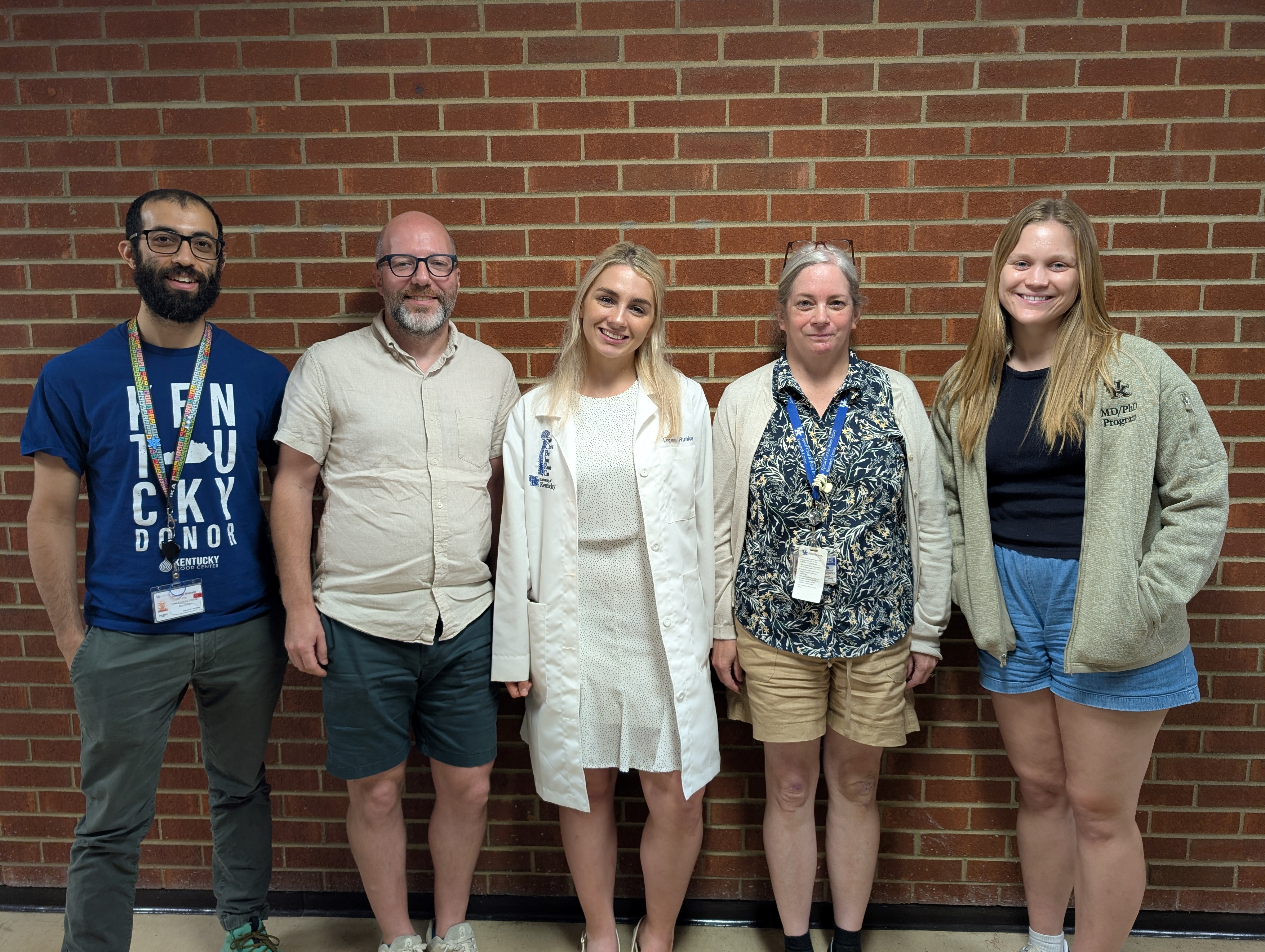 Loganann Runice with mentor, Dr. Ann Stowe and members of the Stowe lab.