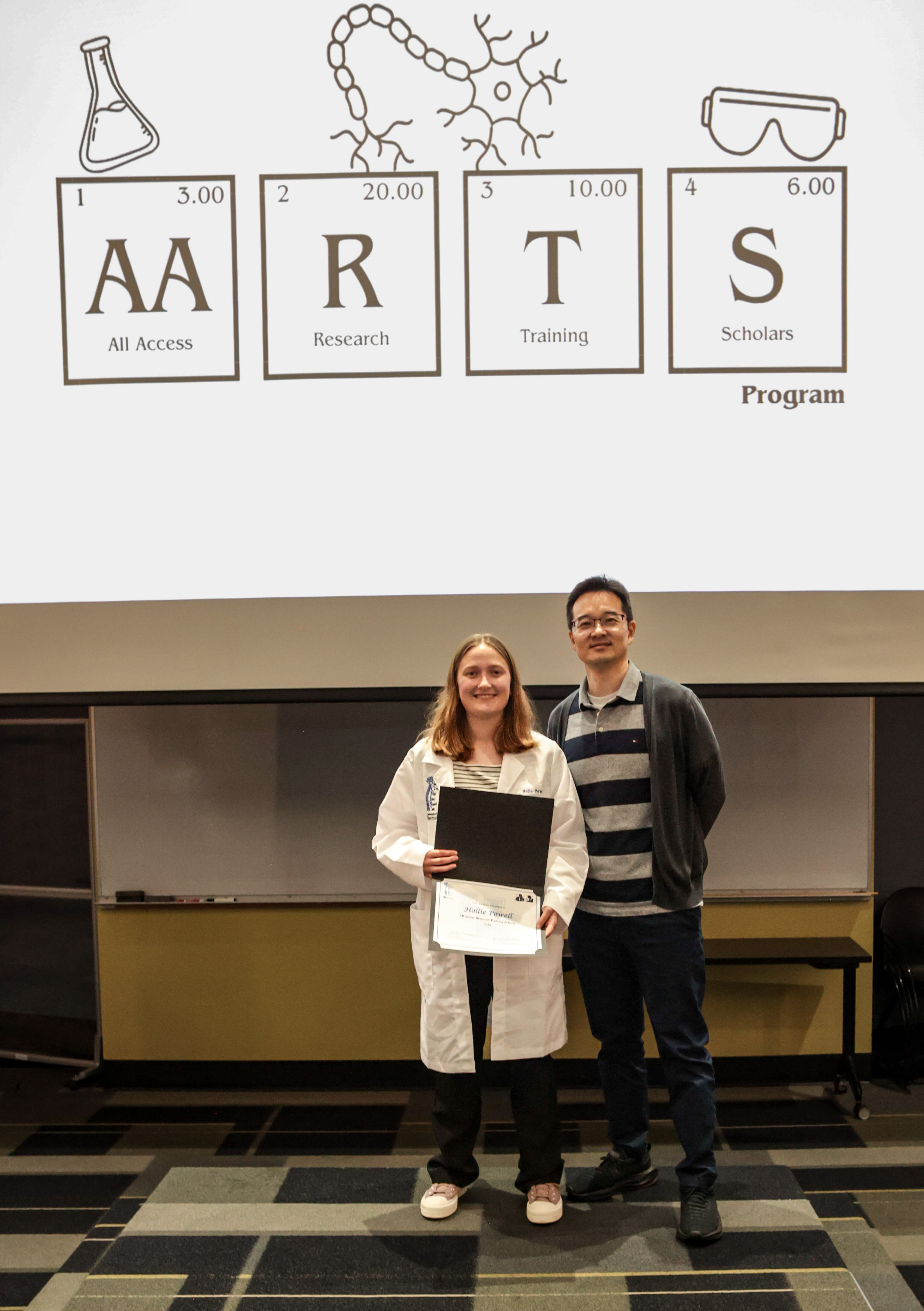 Hollie Powell and mentor, Dr Jonghyuck Park during the AARTS 2026 Symposium