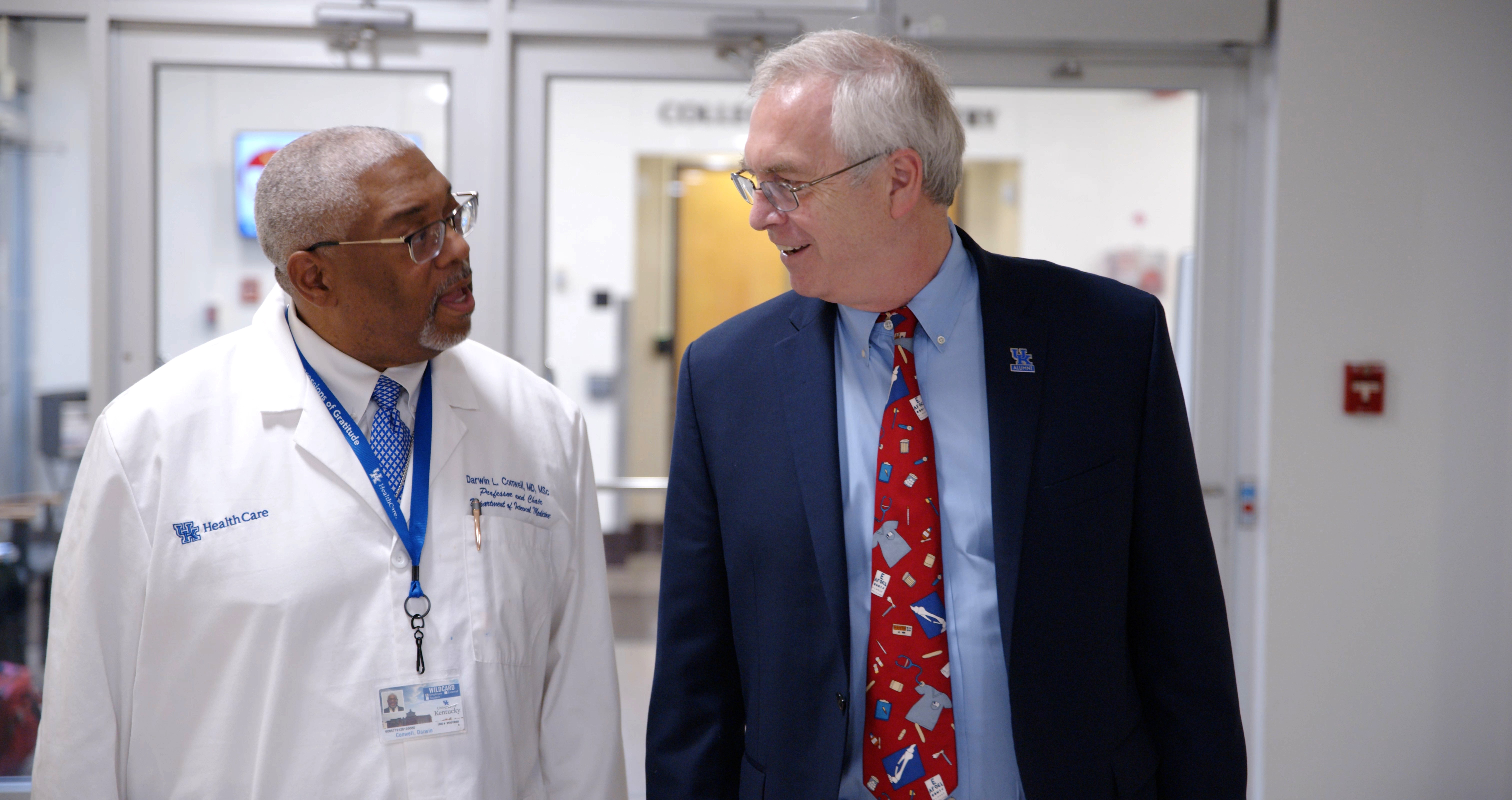 Darwin Conwell walks and talks with Dean Chipper Griffith