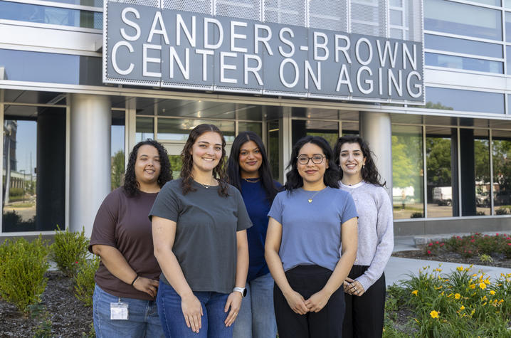 Sierra Turner, Valerie Allen, Meghana Gazula, Andrea Hernandez Gonzalez and Osswaah Fariduddin in front of the Sanders Brown Center on Aging