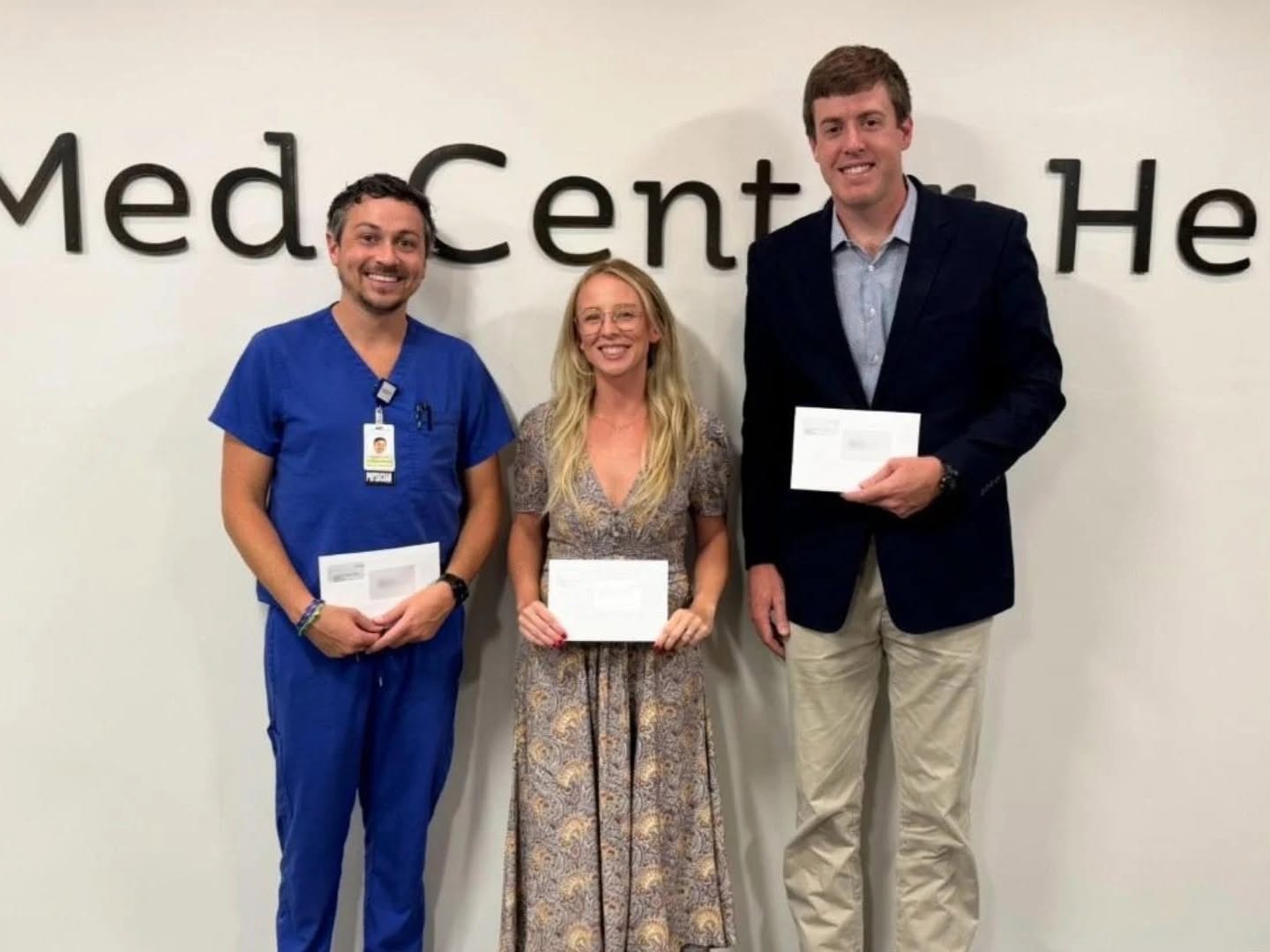 (From left to right): Dr. Darrin Laswell, Dr. Dixi Secula, and Dr. Ethan Smith