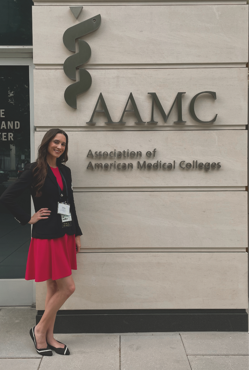 Alicia stands outside the AAMC in Washington D.C. 