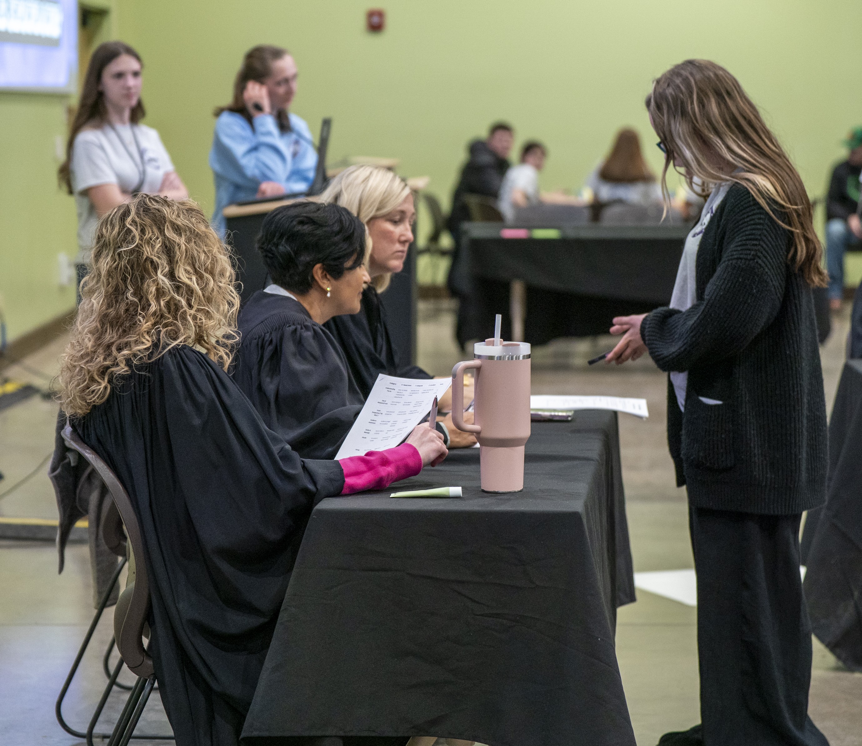 Carey Beth Smith serves as a judge during the conference’s “Clear the Air Challenge” along with CHET Acting Director Shyanika Rose, PhD, MA.