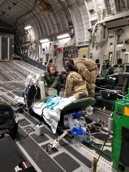 Dr. Chris Belcher Teaching about the ECMO machine during a mission
