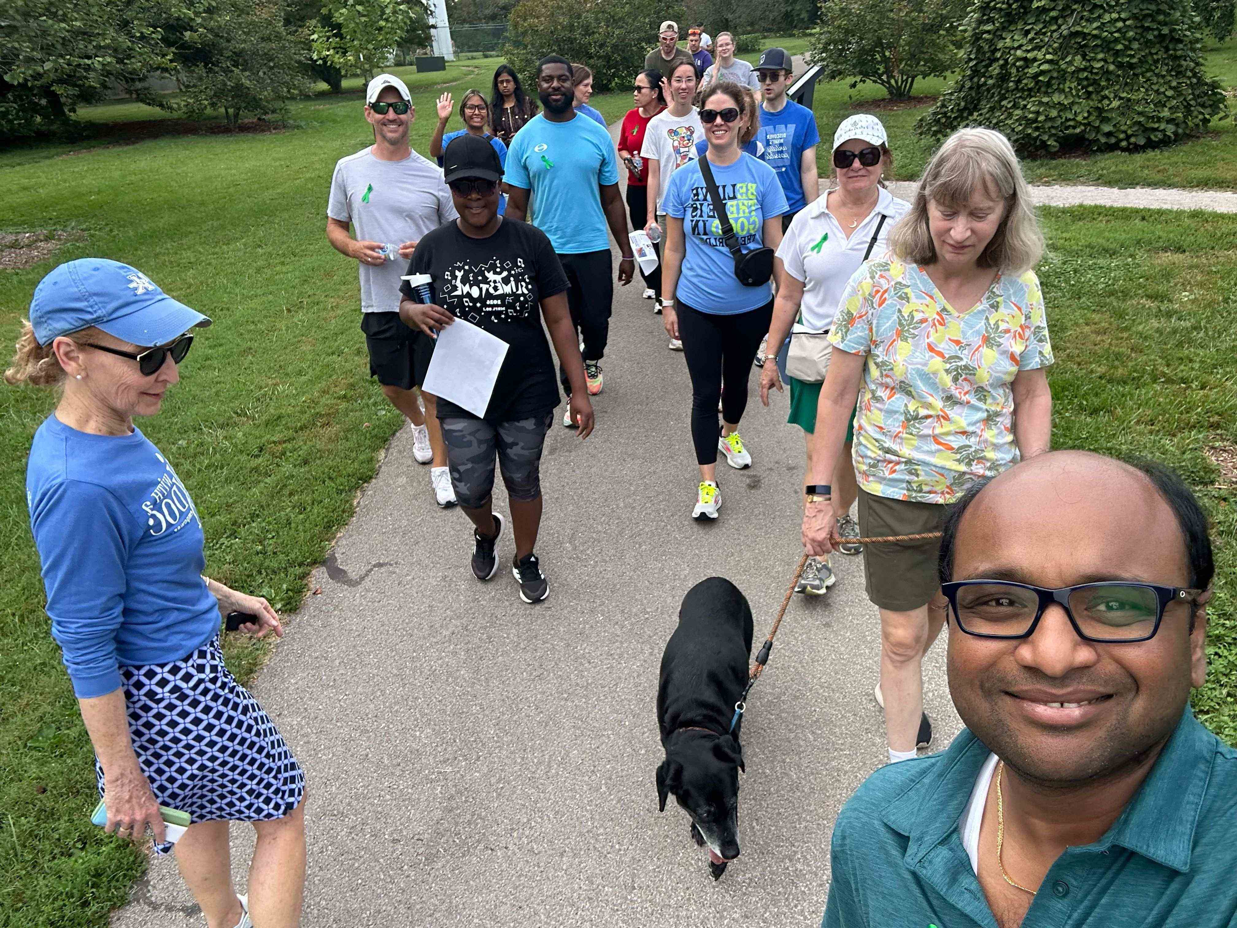 Konjeti and other walkers on path through the Arboretum