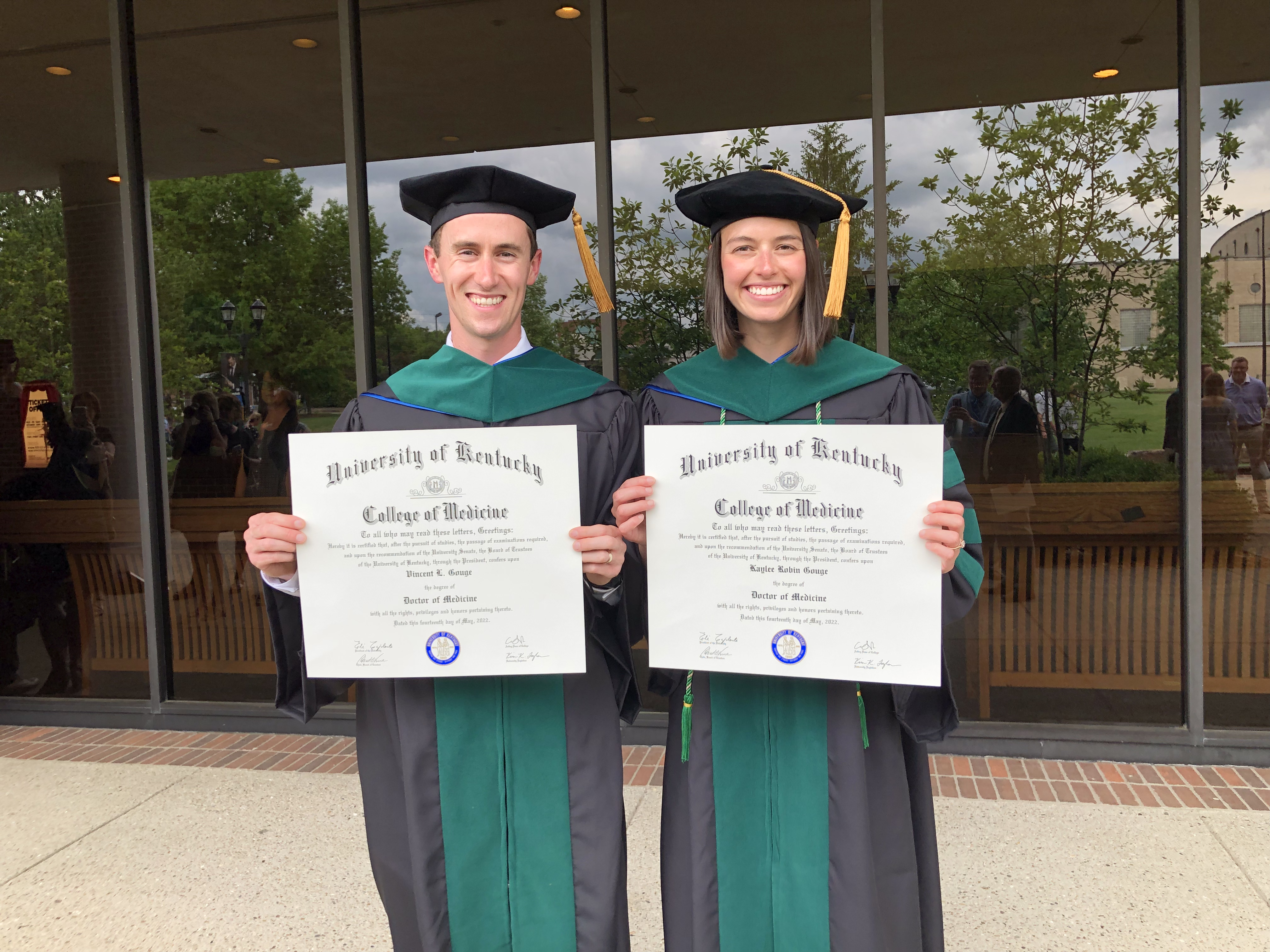 Kaylee Gouge, MD with her husband at graduation 