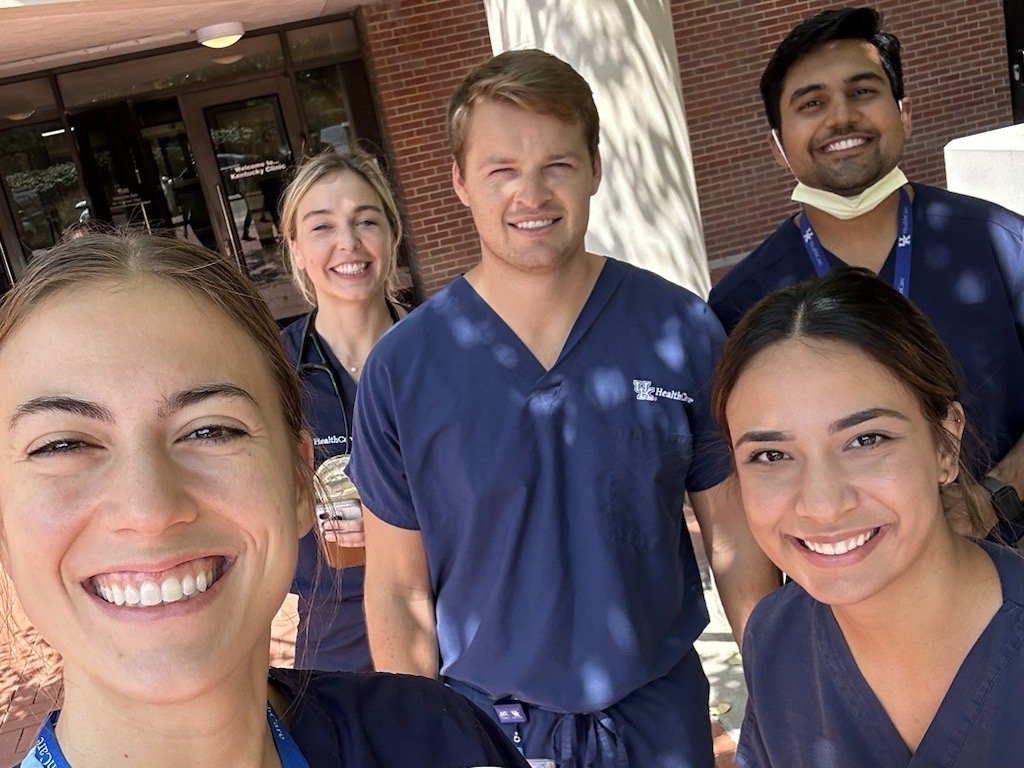 Sara Khandani and other med students pose in scrubs for a selfie