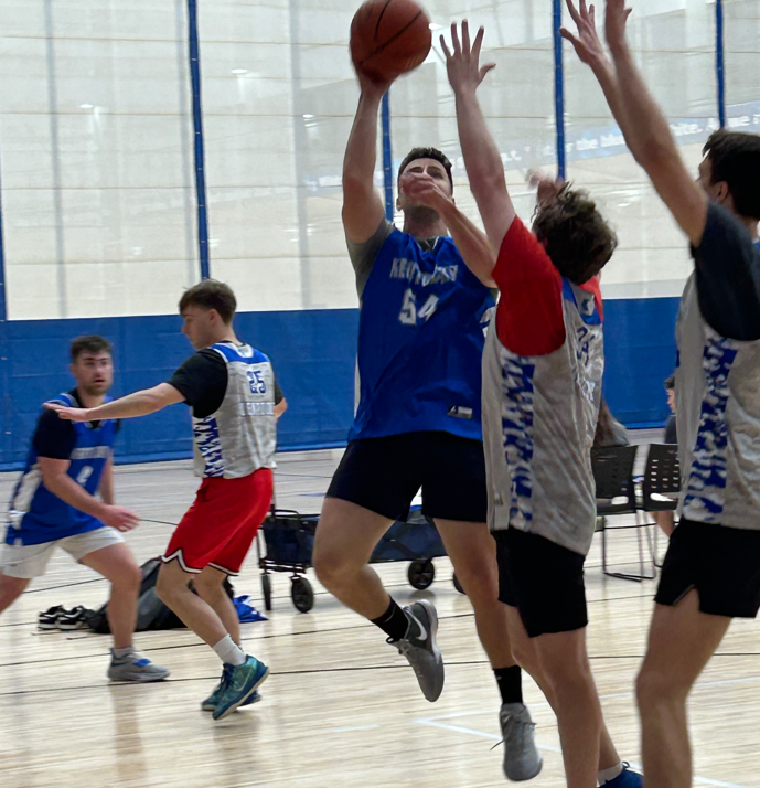 white coats playing basketball