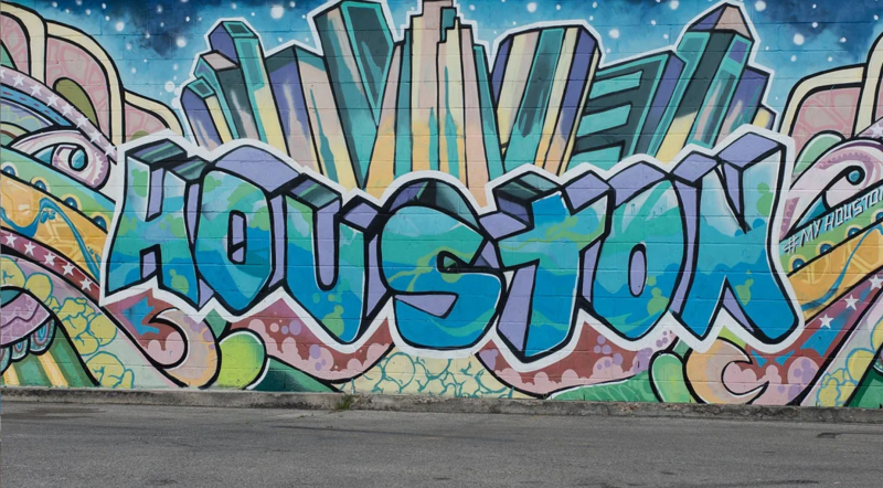 Photo of the word Houston written in graffiti.