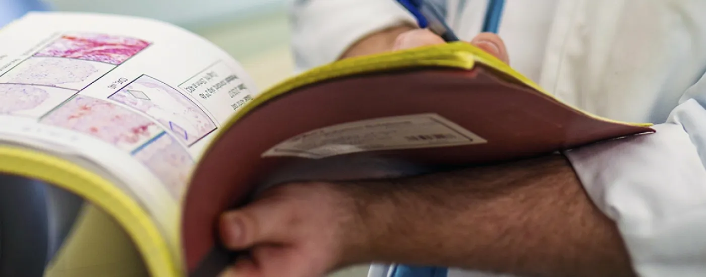 Researcher holding a folder