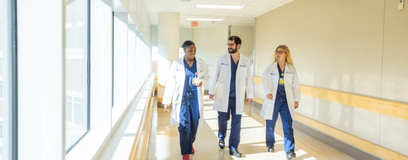 Hospital hallway people walking