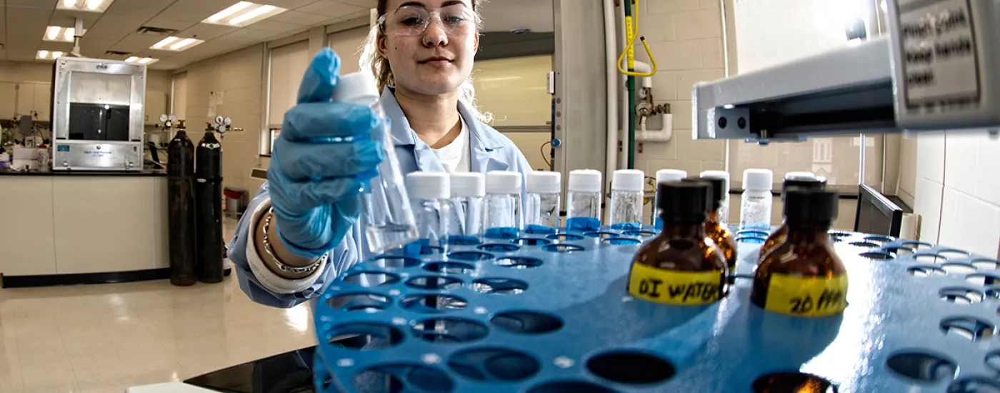 Young female scientist in research lab