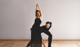 Renee Gallagher and Hans Schmitt, posing mid-dance.