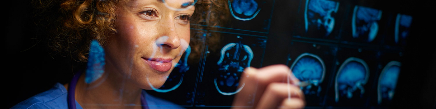 Person reviewing imaging pictures of a brain